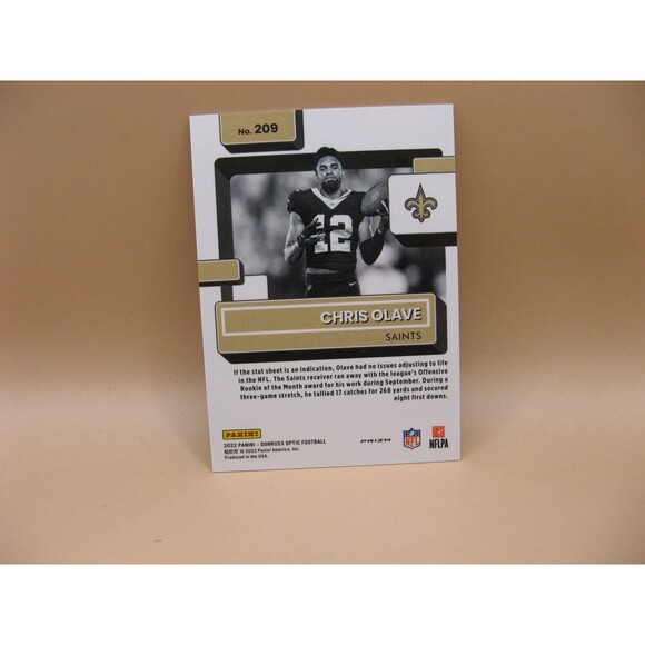 Chris Olave 2022 Donruss Rated Rookie OPTIC Holo Negative Variation SP Saints - Picture 2 of 2